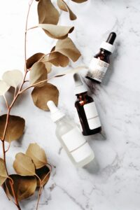 Minimalist skincare products on marble background - gentle routine essentials
