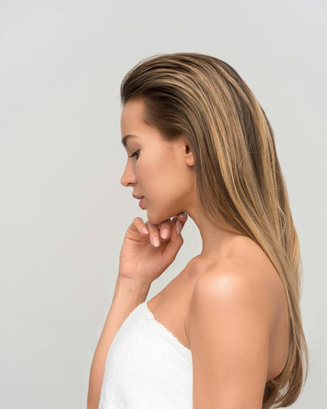 Woman with glowing hydrated skin after SkinVive treatment in Colchester at Bespoke Medical Aesthetics.