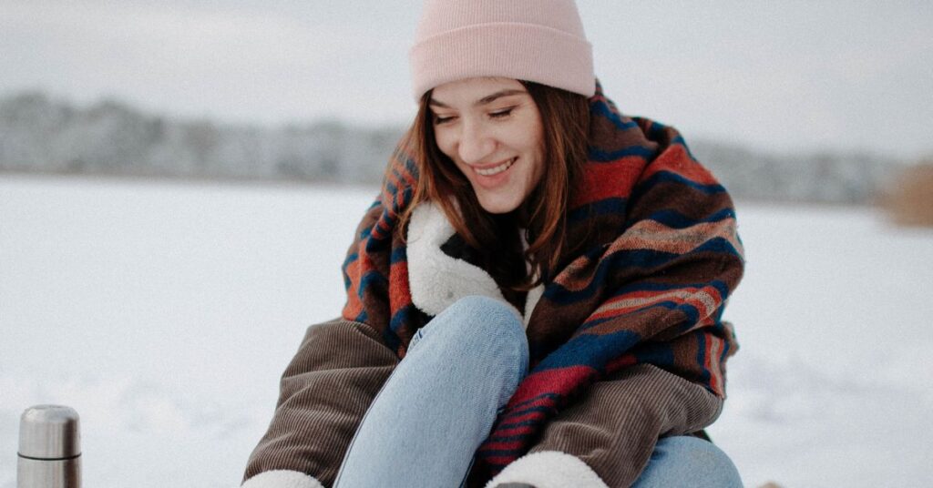 A woman in winter wanting a Winter Skincare routine that is doctor-led in Colchester at Bespoke Medical Aesthetics