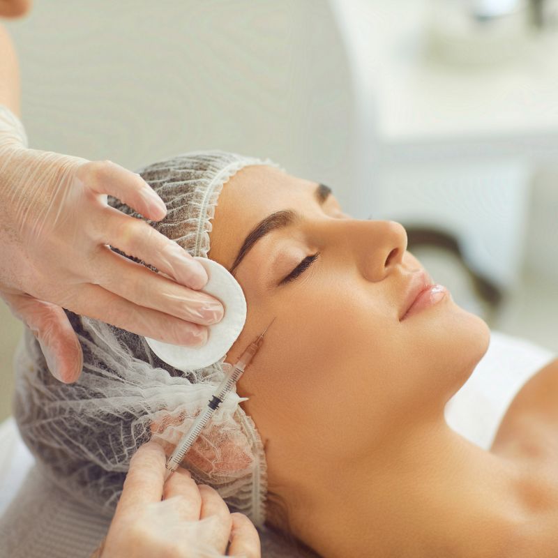 A picture showing a patient receiving an injectable such as Profhilo in Colchester which complement DermaPen microneedling in Colchester